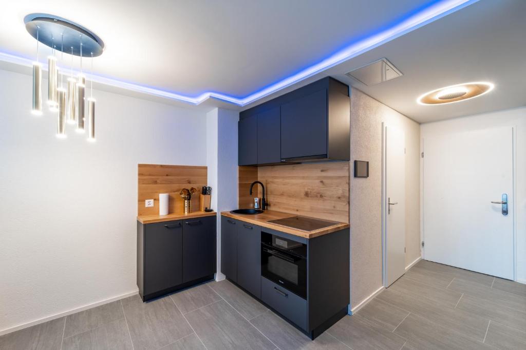 Kuchyň nebo kuchyňský kout v ubytování Traumwohnung in Interlaken inklusive SPA-Bereich