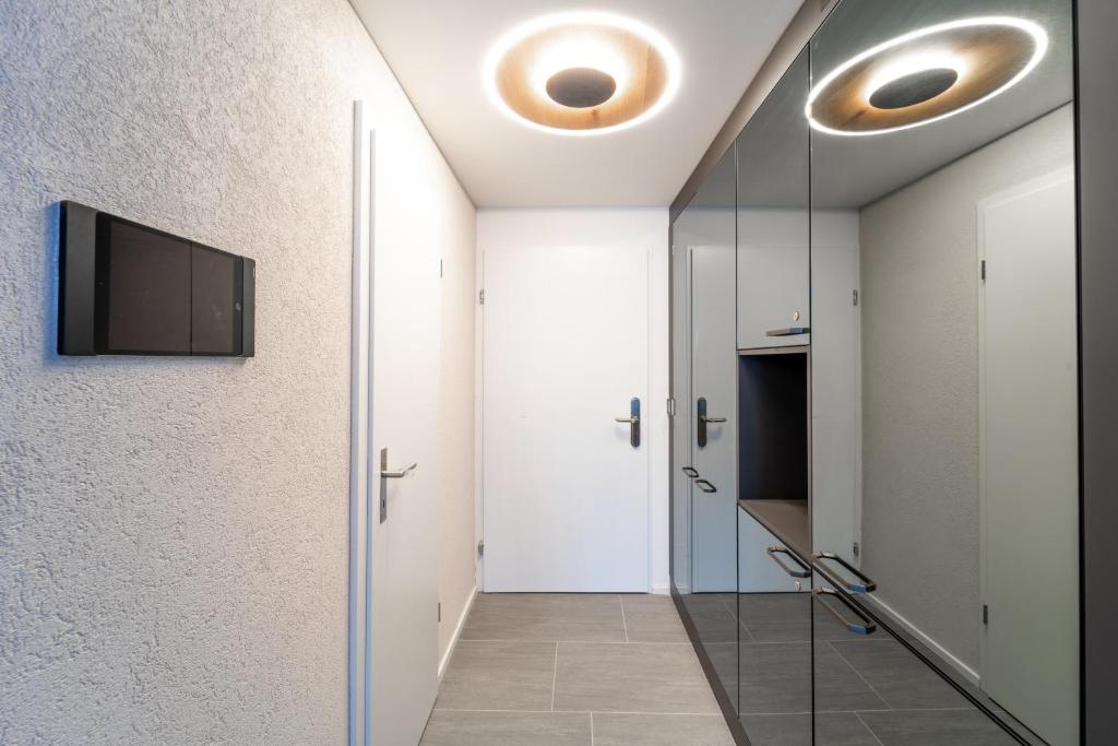 TV a/nebo společenská místnost v ubytování Traumwohnung in Interlaken inklusive SPA-Bereich