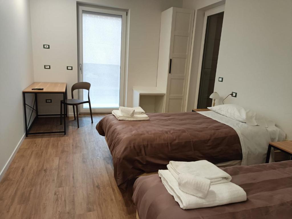 Postel nebo postele na pokoji v ubytování Casa Tua