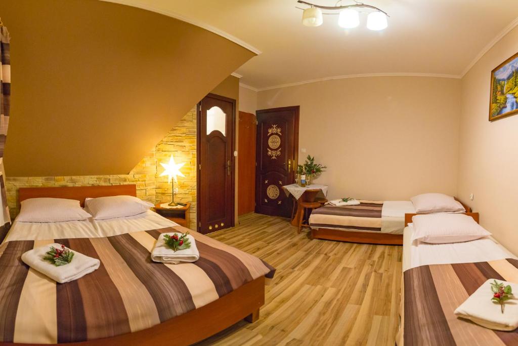 Posteľ alebo postele v izbe v ubytovaní Domek Deluxe Resort Willa Adrian