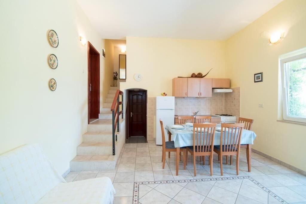 Kuchyň nebo kuchyňský kout v ubytování Apartment Orange