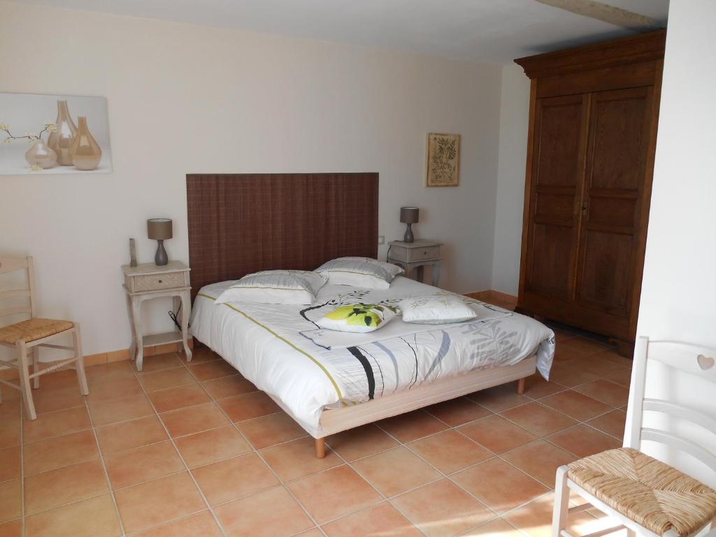 Postel nebo postele na pokoji v ubytování Le Pressoir B&B