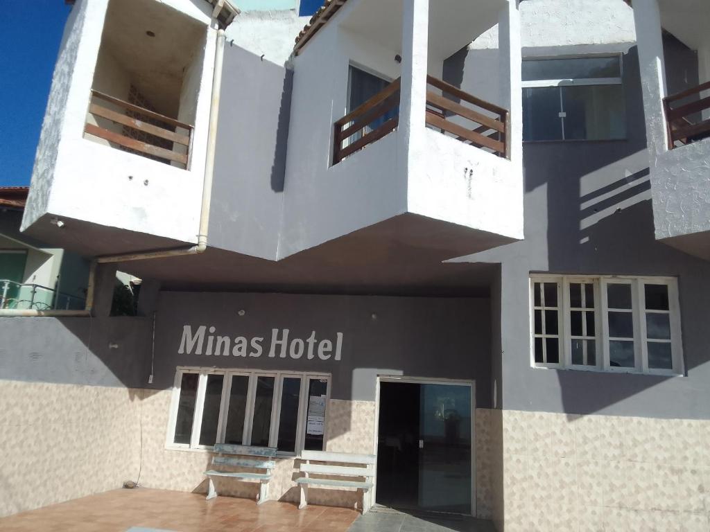 a building with two balconies on top of it at Minas Hotel in Alcobaça