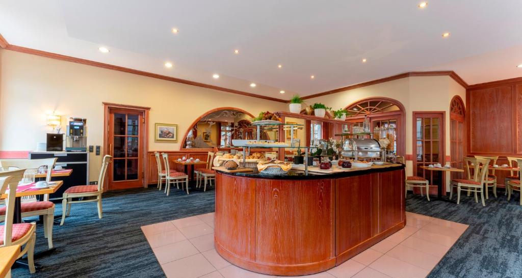Nápoje v ubytování PLAZA Premium Parkhotel Norderstedt