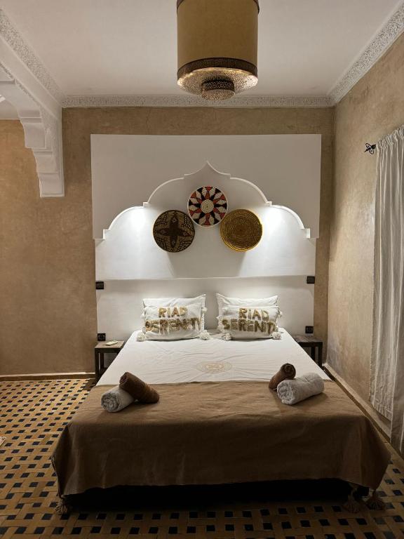 Postel nebo postele na pokoji v ubytování Riad dar serenity