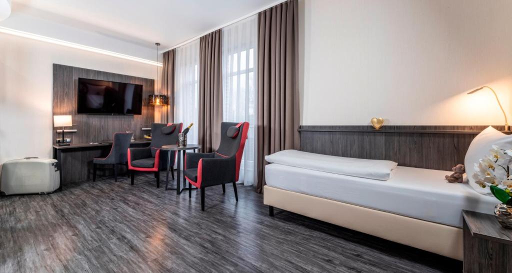 PLAZA Premium Parkhotel Norderstedt - トリプルルーム