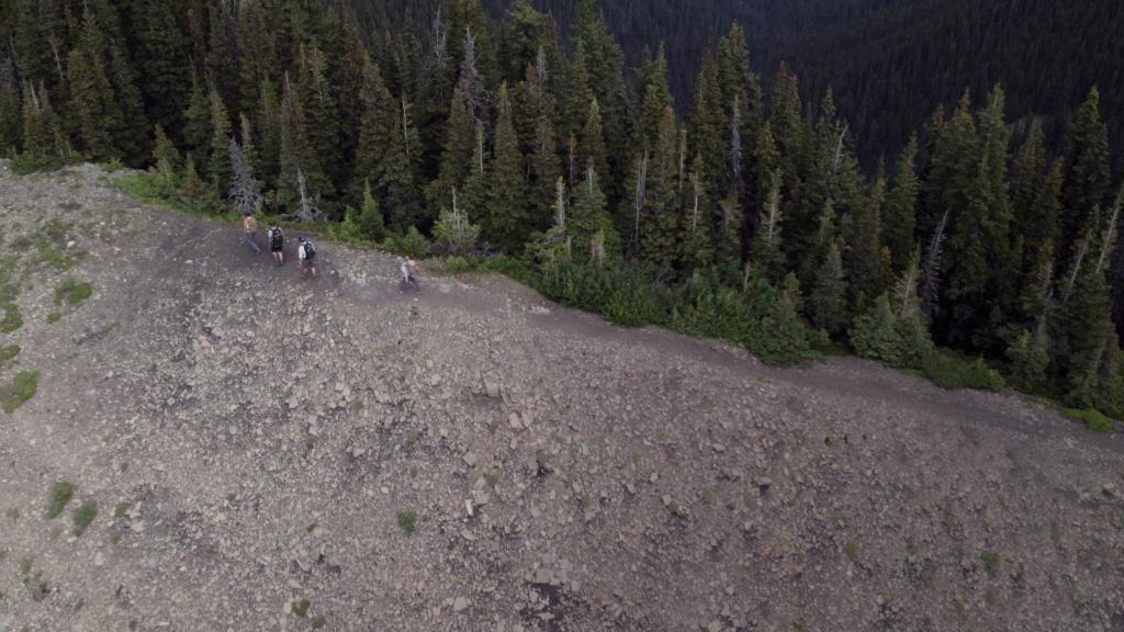 a group of people standing on top of a mountain at Jasper East Hostel - Near Jasper National Park East Gate Entrance in Jasper