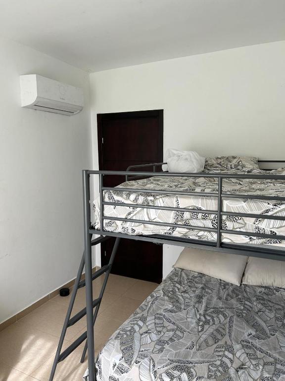 Postel nebo postele na pokoji v ubytování Appartement de standing Résidence Kariat Cabo