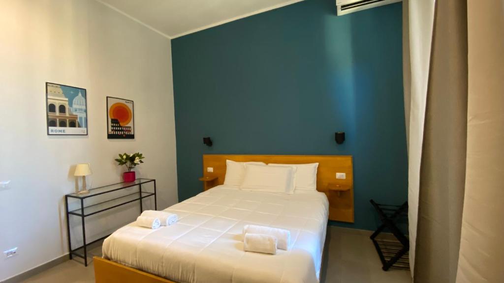 Posteľ alebo postele v izbe v ubytovaní Casa Cecilia