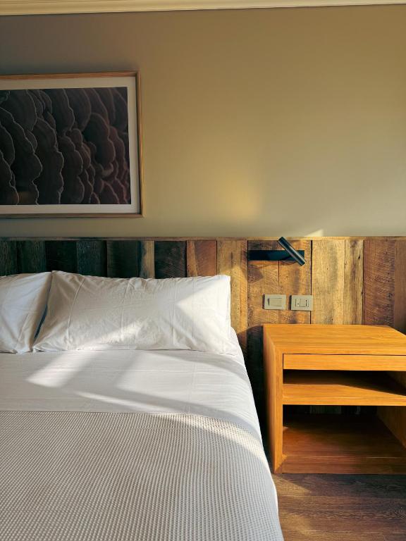 Postel nebo postele na pokoji v ubytování Cascadas Hotel