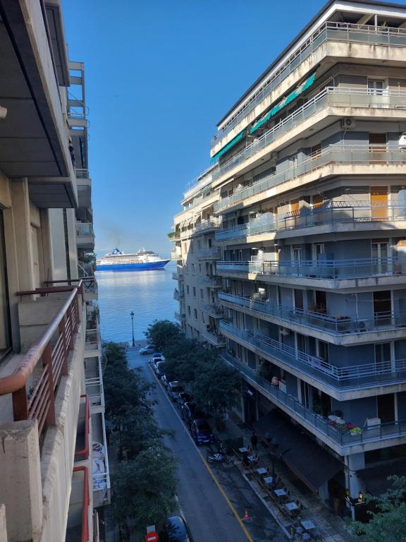 arial view of a large apartment building next to the water at Lux Downtown Sea View Apartment D3 in Thessaloniki