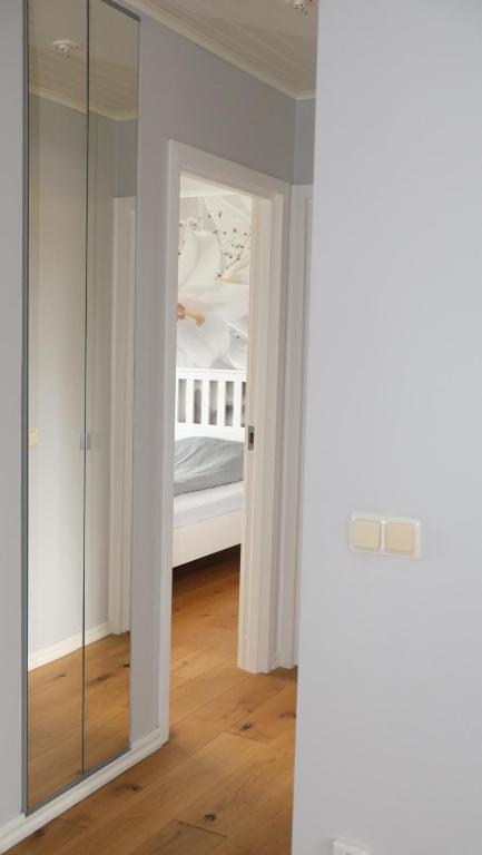 Postel nebo postele na pokoji v ubytování Apartments Smålandsstenar