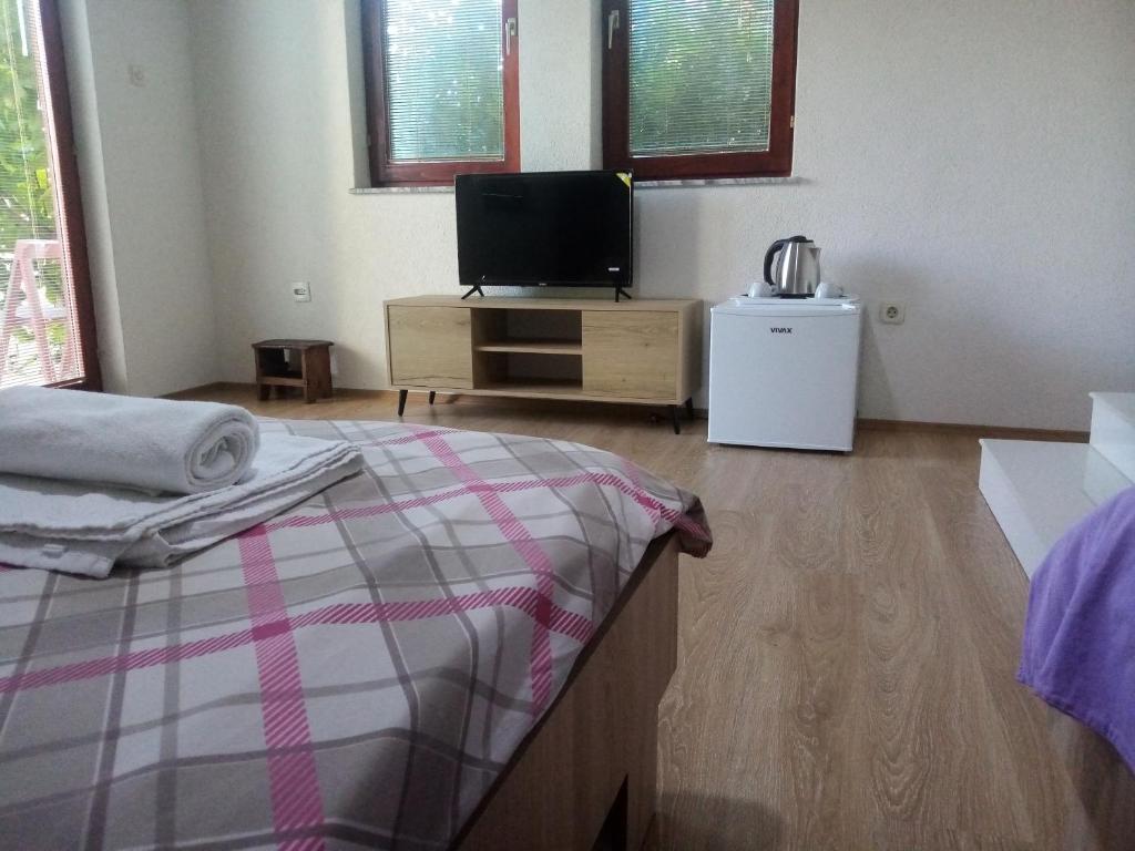 Postel nebo postele na pokoji v ubytování Villa OHRID -"LAKE VIEW"
