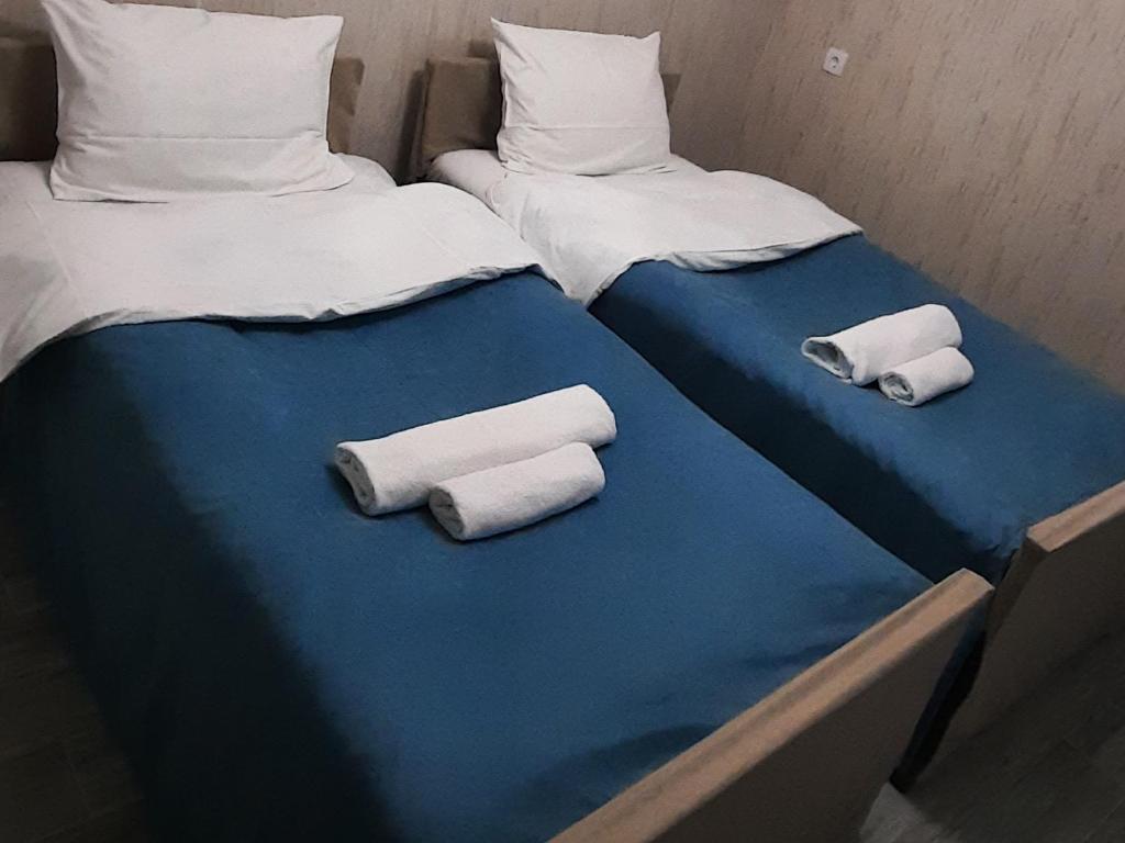 Postel nebo postele na pokoji v ubytování Maganiskhedi