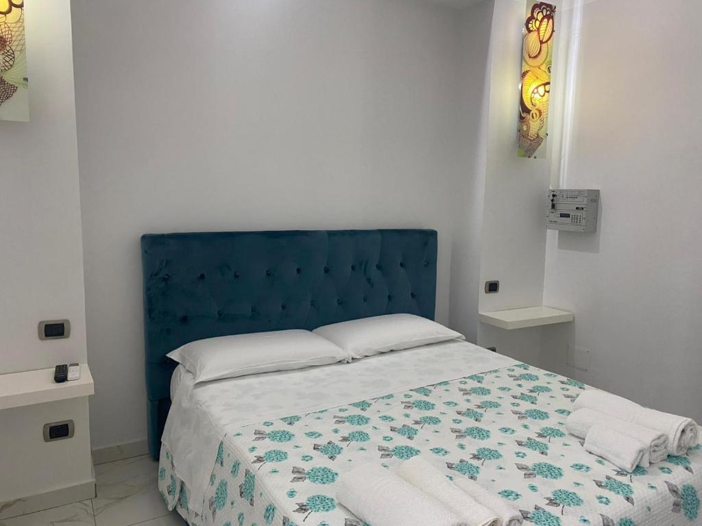 Postel nebo postele na pokoji v ubytování casa esmeralda