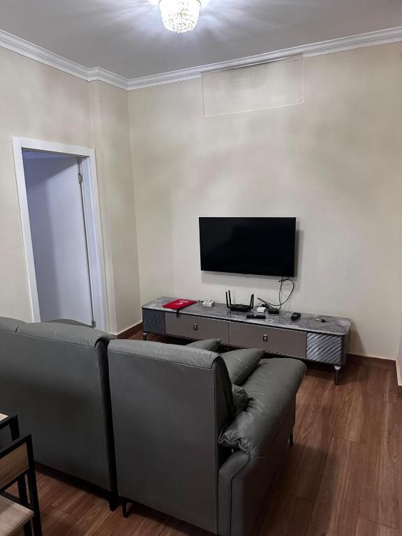 TV a/nebo společenská místnost v ubytování Aconchego da Mutamba