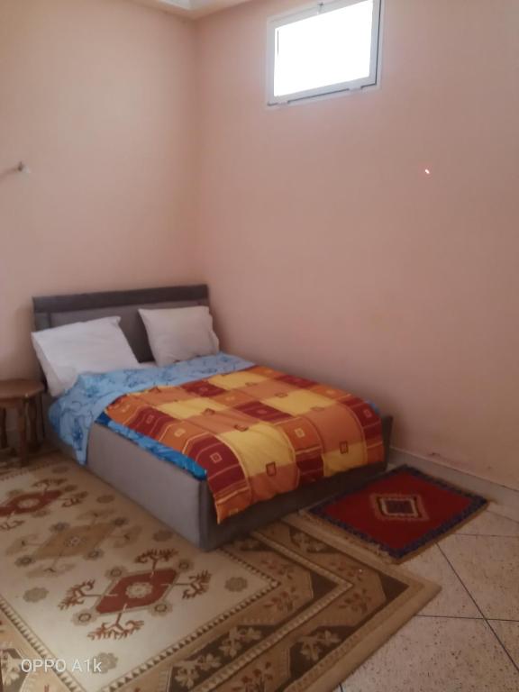 Postel nebo postele na pokoji v ubytování chez l'habitant amazigh