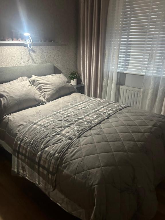 Postel nebo postele na pokoji v ubytování Natonia House