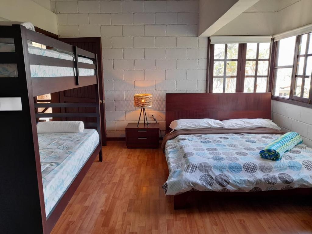 Postel nebo postele na pokoji v ubytování Hotel MACA lago calima