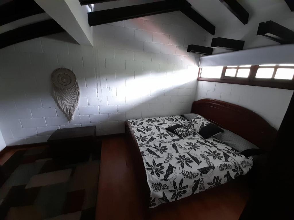Postel nebo postele na pokoji v ubytování Hotel MACA lago calima