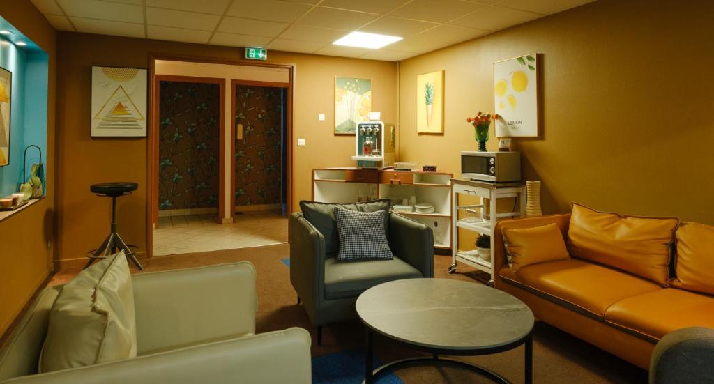 Posezení v ubytování Hotel Tambourin