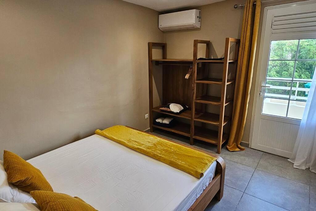 Postel nebo postele na pokoji v ubytování L'ecrin du carmel