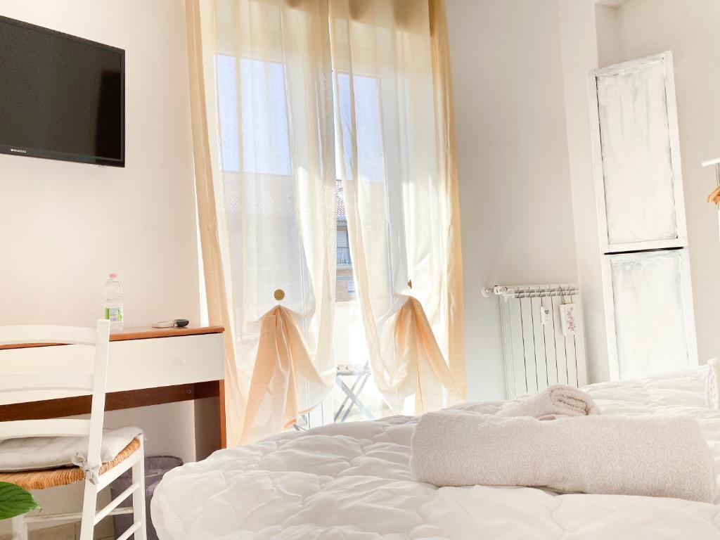 Letto o letti in una camera di Ophele House Rome