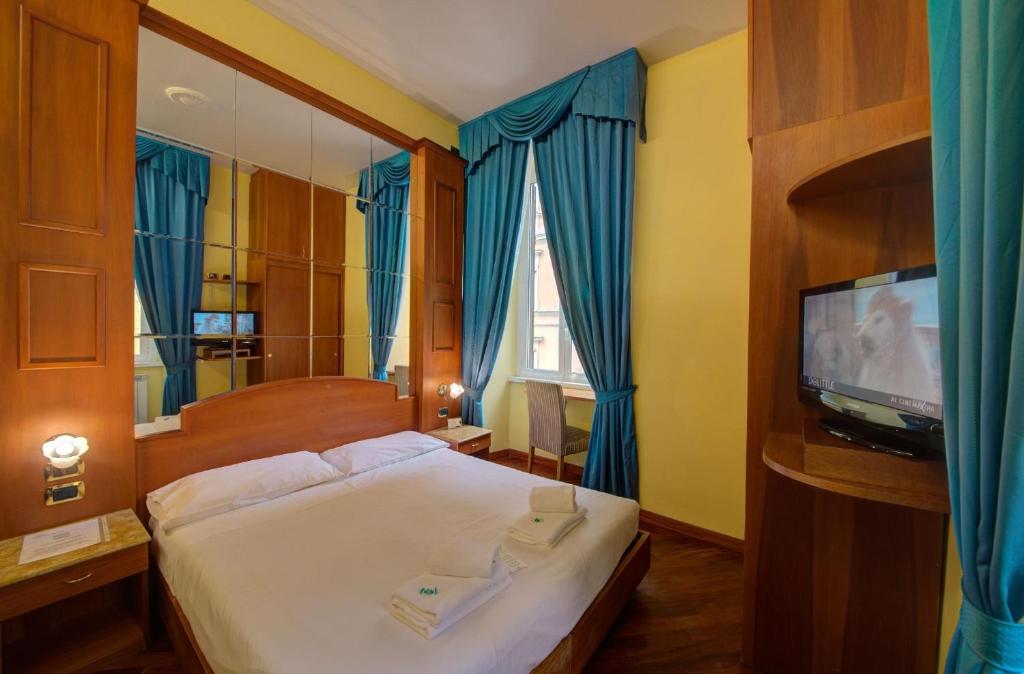 Postel nebo postele na pokoji v ubytování 69 Manin Termini