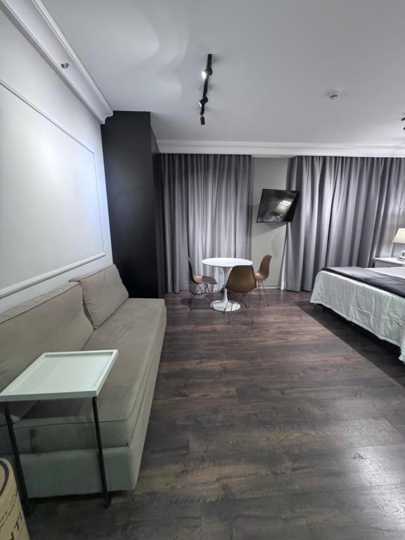 Postel nebo postele na pokoji v ubytování Flat Higienópolis Com Varanda
