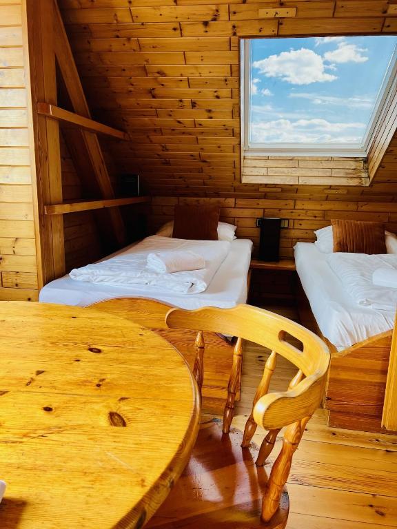 Postel nebo postele na pokoji v ubytování Hotel Nest