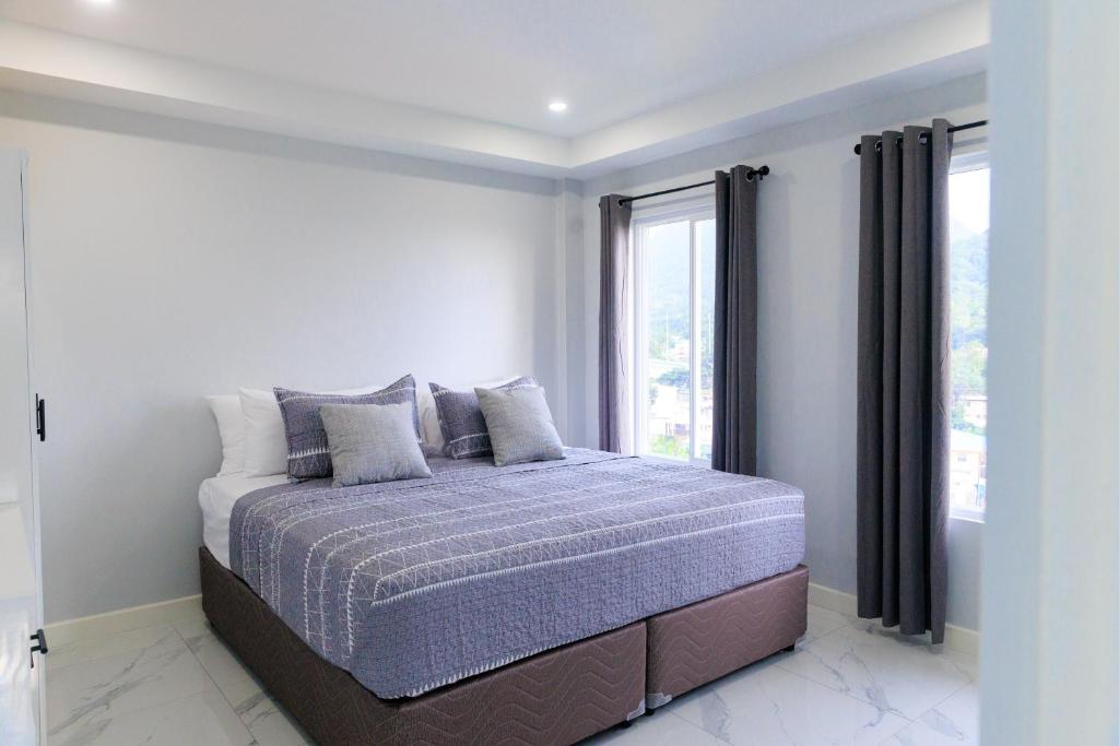 Postel nebo postele na pokoji v ubytování Caldera Villas