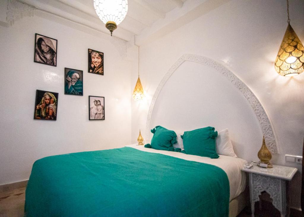 Postel nebo postele na pokoji v ubytování Riad Tala