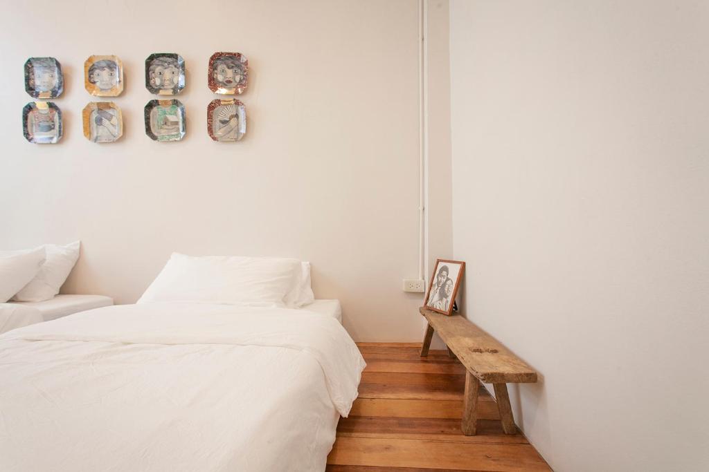 Postel nebo postele na pokoji v ubytování Mana Craft Stay
