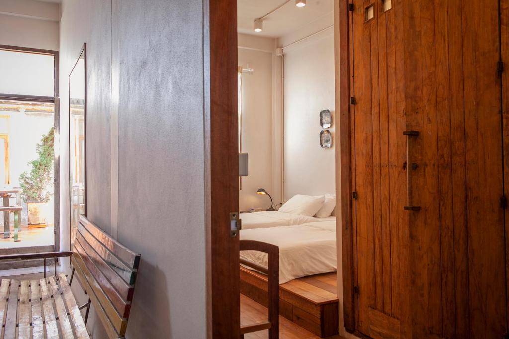 Postel nebo postele na pokoji v ubytování Mana Craft Stay