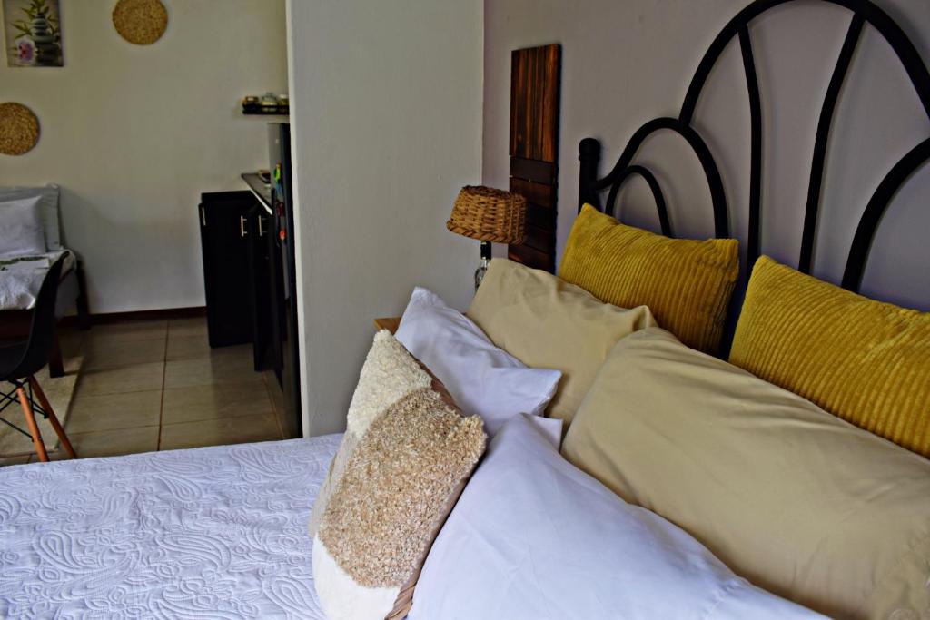 Postel nebo postele na pokoji v ubytování Villa Buenaventura Loft