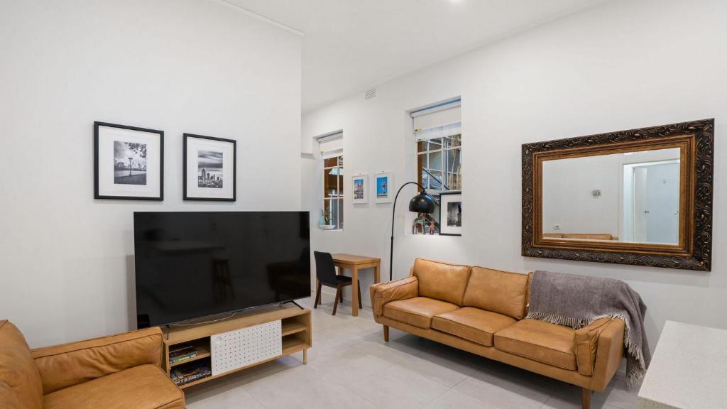 TV a/nebo společenská místnost v ubytování Gordon House Apartments