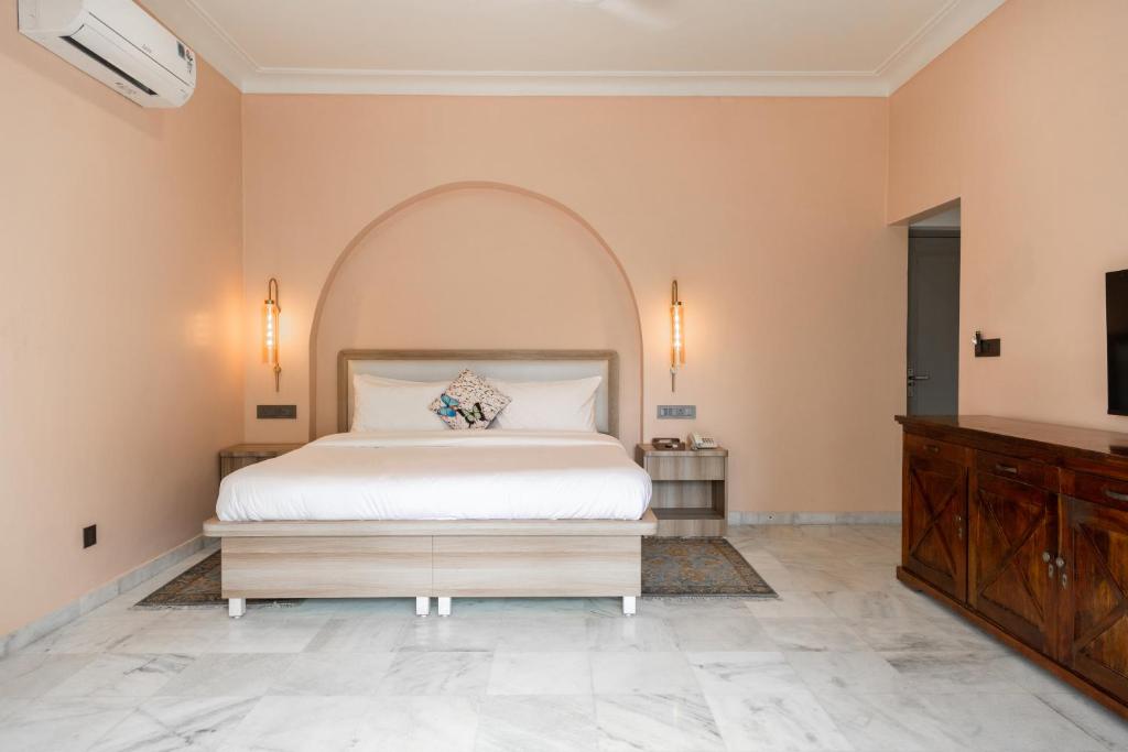 Llit o llits en una habitació de Girisadan Boutique Stay