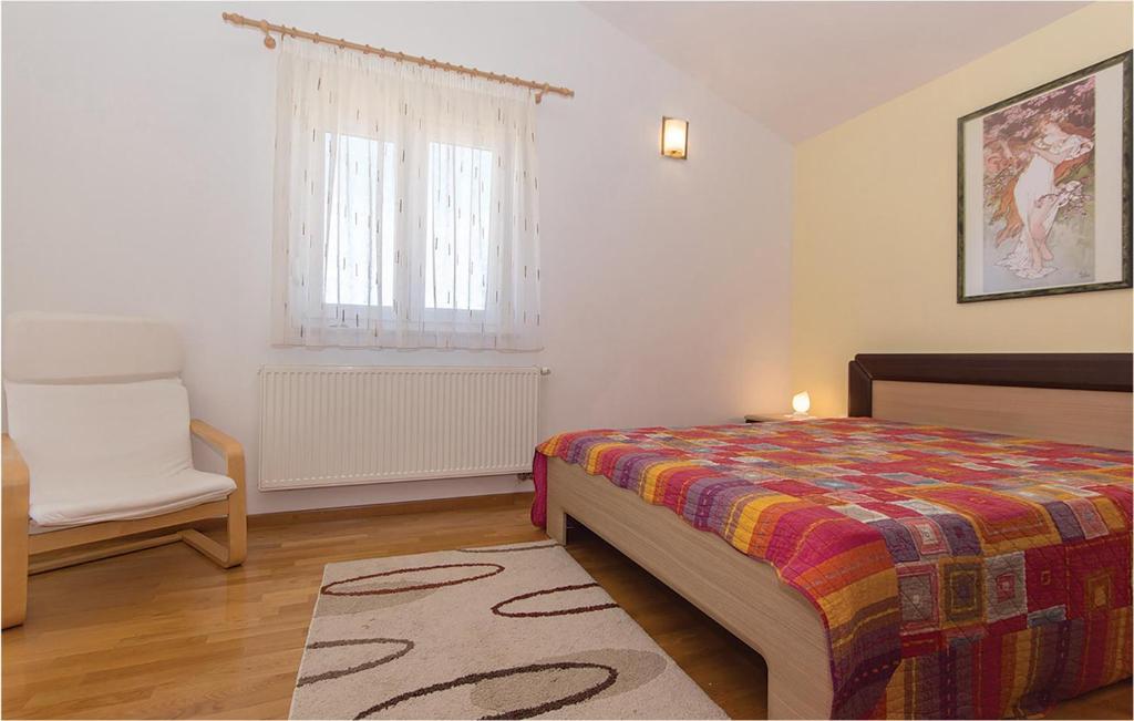 Łóżko lub łóżka w pokoju w obiekcie Holiday Home Volme