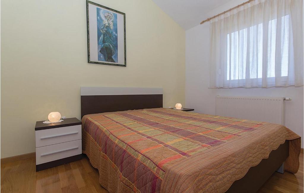 Łóżko lub łóżka w pokoju w obiekcie Holiday Home Volme