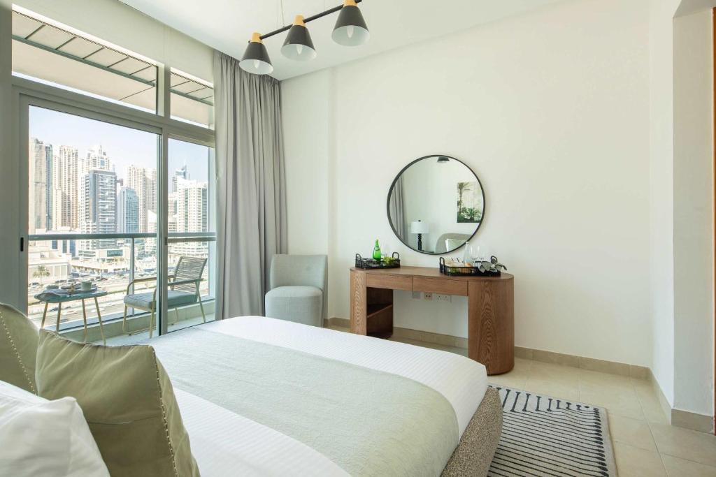 Giường trong phòng chung tại Frank Porter - Madina Tower