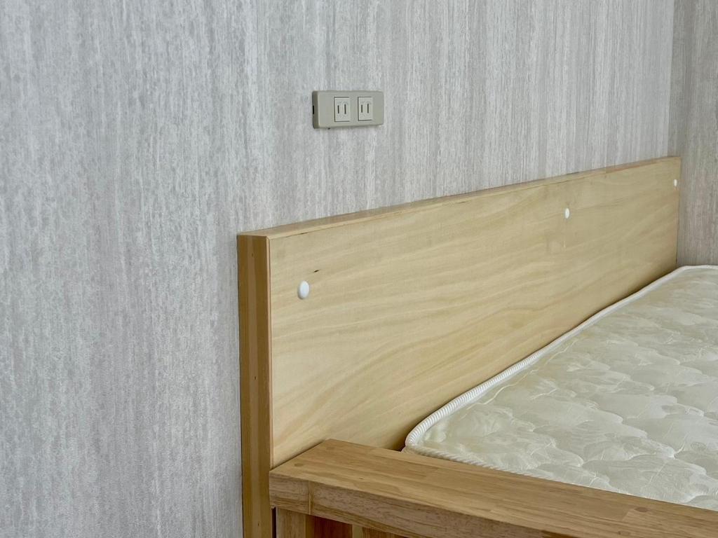 Postel nebo postele na pokoji v ubytování Yuzawa house2