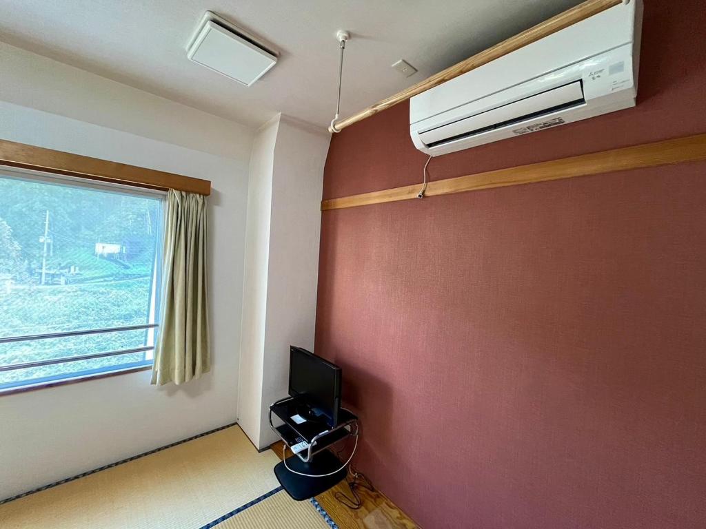 TV a/nebo společenská místnost v ubytování Yuzawa house2