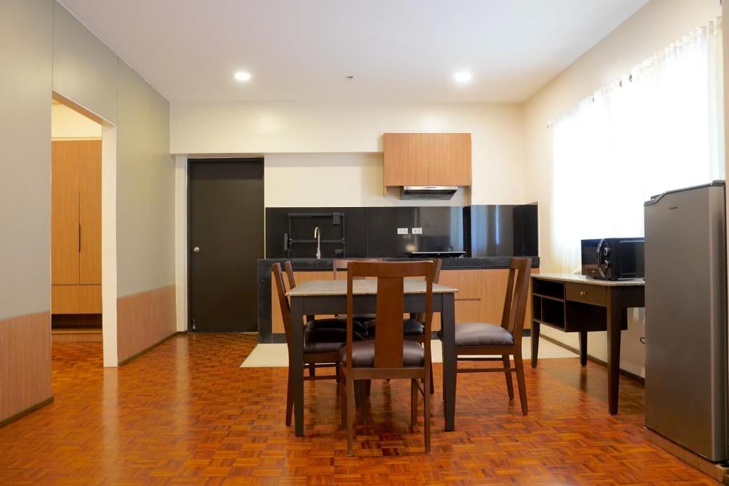 Kuchyň nebo kuchyňský kout v ubytování Tropicana Suites