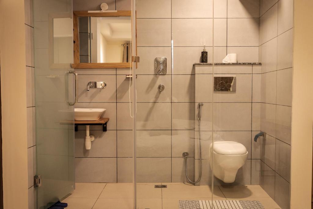 Koupelna v ubytování Sinpa Home Pilachhen