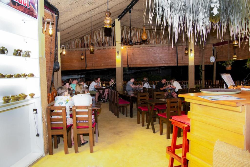 Restaurace v ubytování Coconut Style Restaurant & Milinda Guest