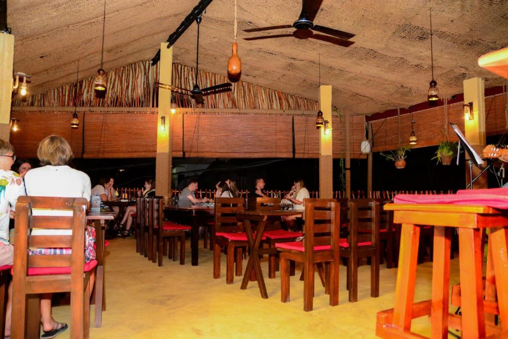 Restaurace v ubytování Coconut Style Restaurant & Milinda Guest