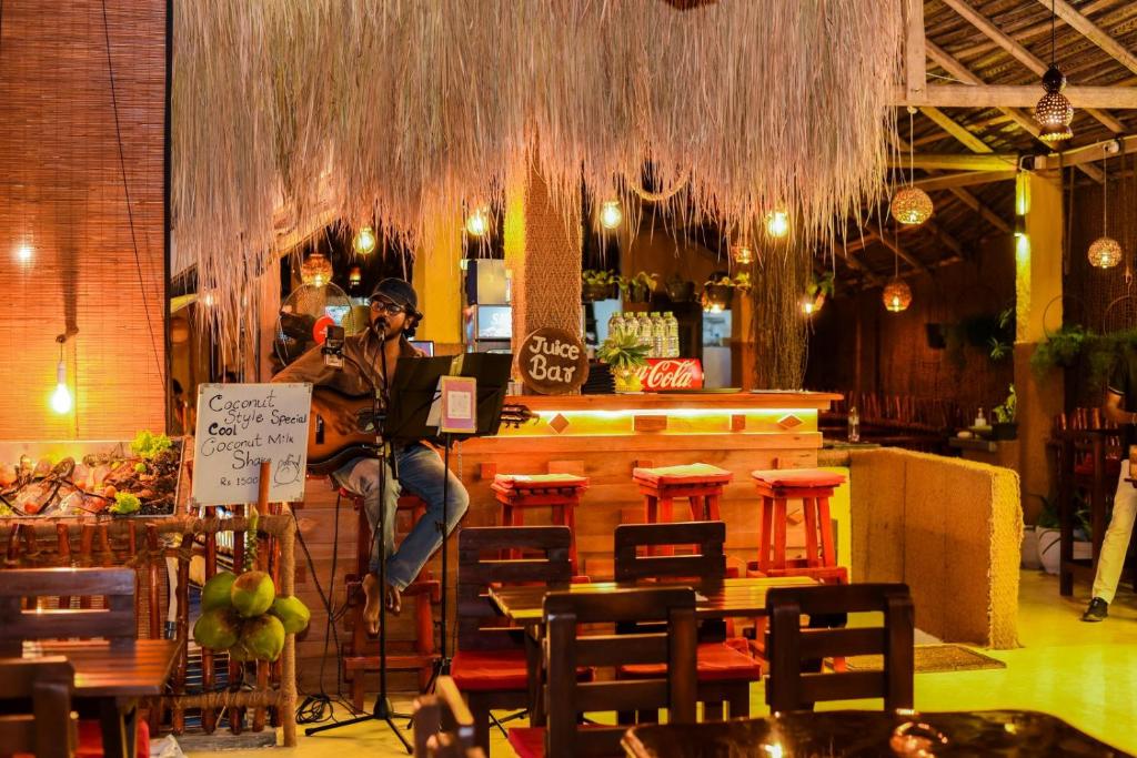 Restaurace v ubytování Coconut Style Restaurant & Milinda Guest