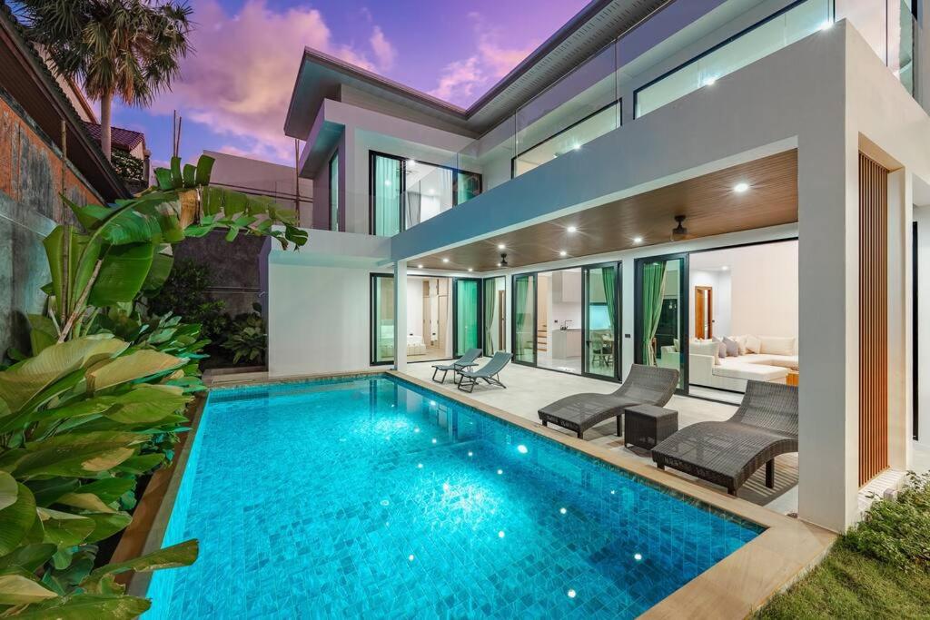 an image of a swimming pool in a house at Peaceful Paradise in Saiyuan Villa V147 in Ban Saiyuan (1)