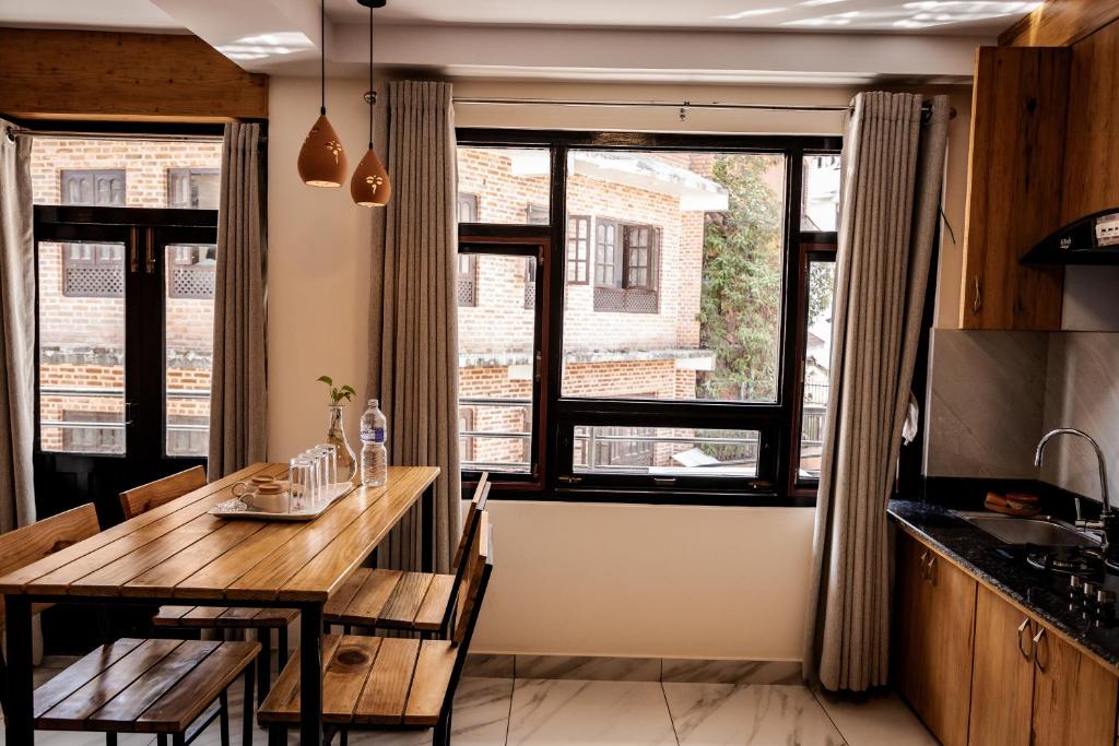 Kuchyň nebo kuchyňský kout v ubytování Sinpa Home Pilachhen