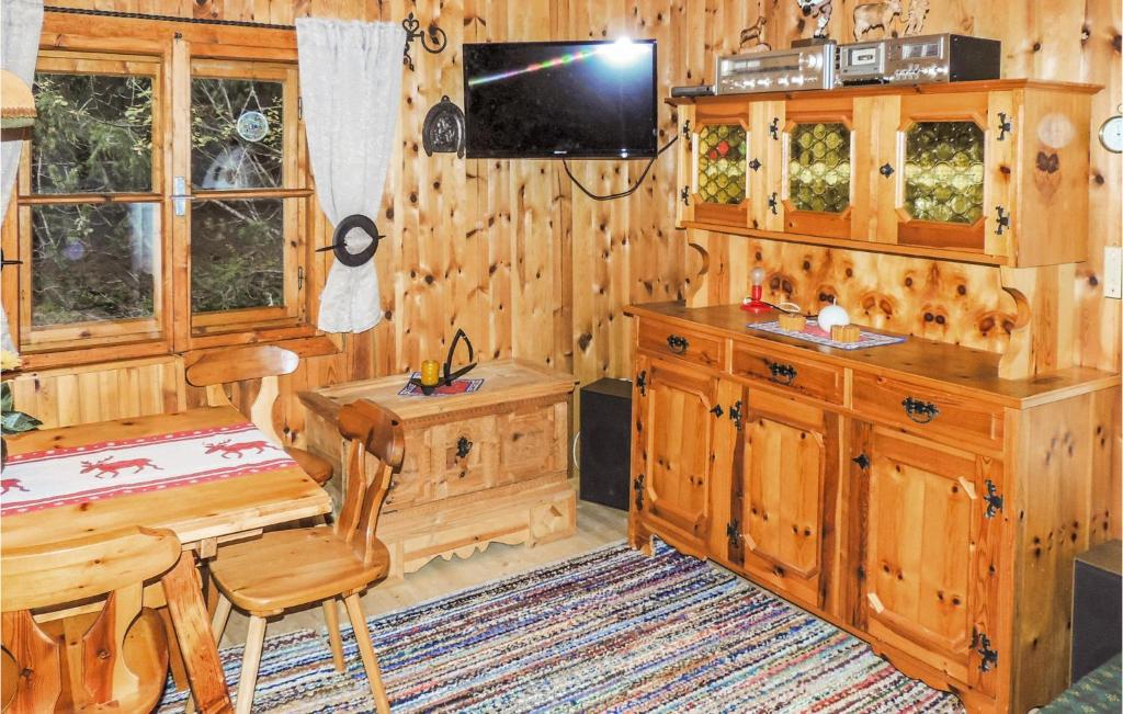 A television and/or entertainment centre at Erholsames Ferienhaus Pillberg